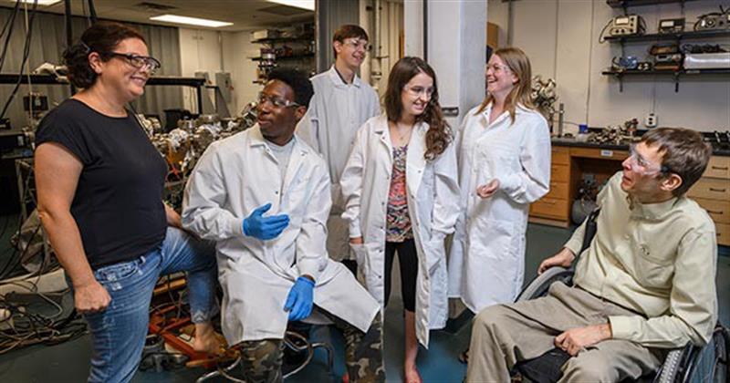 Students and faculty in a research lab