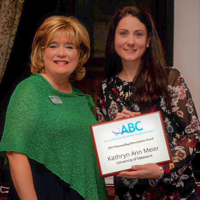 Kathryn Meier with award certificate