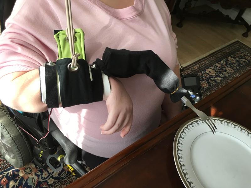 Woman using mechanical fork
