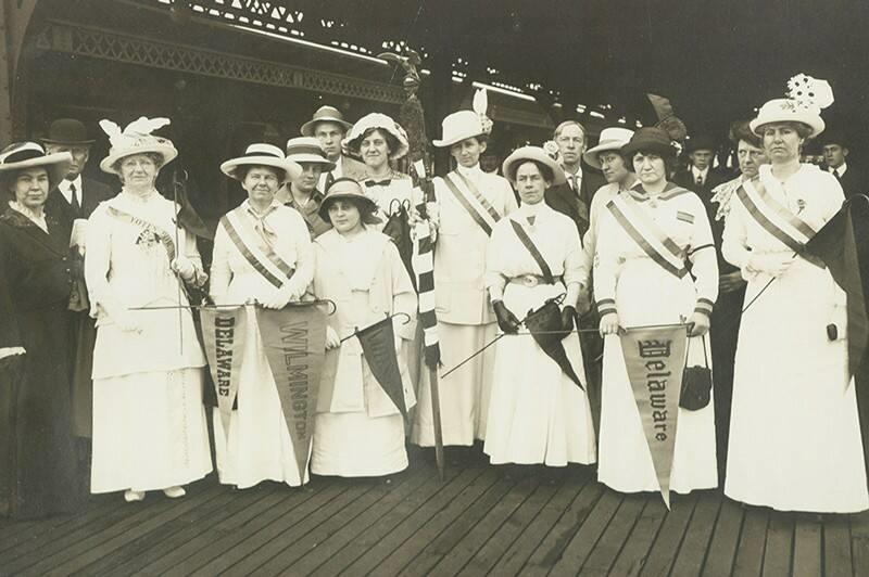 Group of women with suffrage banners