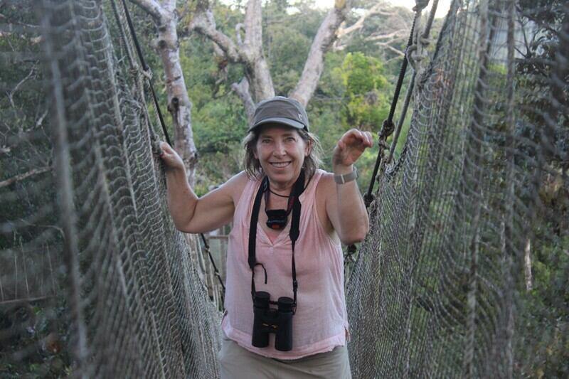 woman on rope bridge