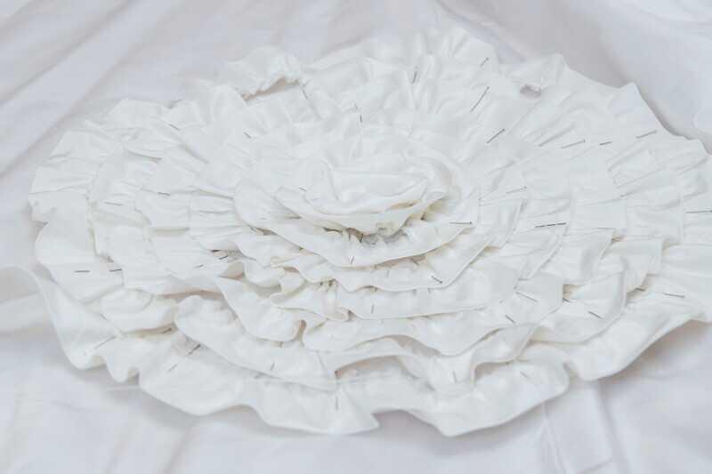 white rosette made from fabric