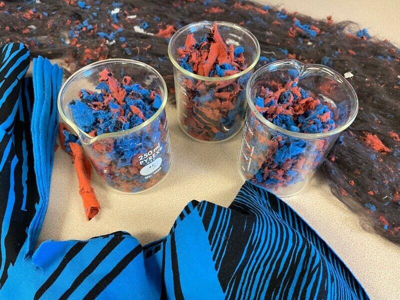 Cups filled with shredded fabric