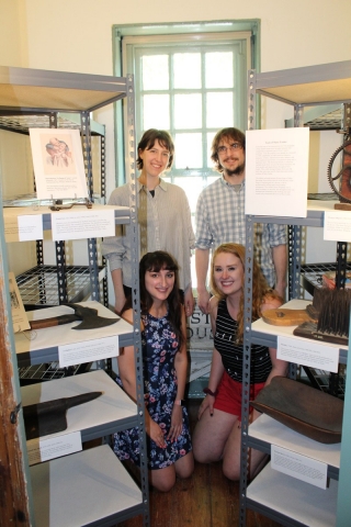 Students with an exhibit of tools