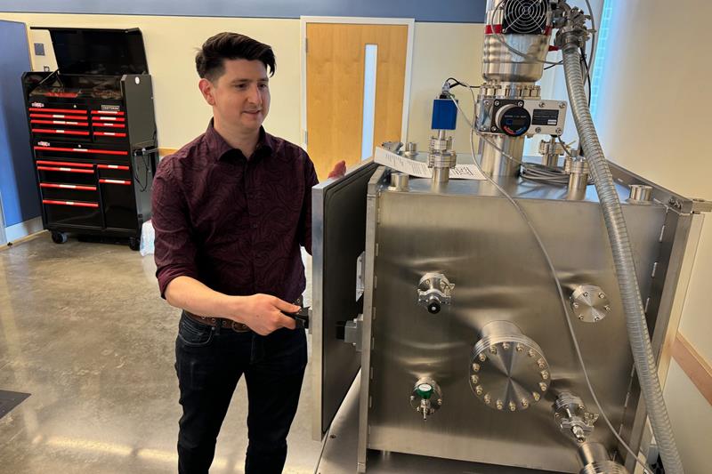 Bennett Maruca with new thermal vacuum chamber
